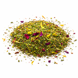 Heap of dried herbs (Bonnie's Little Helper: Herbal Tea Blend) and flowers on a white background