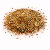 Heap of dried herbs (Calmer Than You Are: Green Tea Blend) on a white background