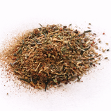 Dry herbs and spices (Calmer Than You Are: Green Tea Blend) on a white background