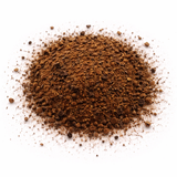 Ground Roots and tea powder (Chai Guy: Black Tea Blend) on a white background