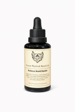 Bottle of Forest Warlock Beard Oil with dropper on a white background