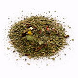 Heap of dried herbs (Laurel's Clean Slate: Herbal Tea Blend) on a white background