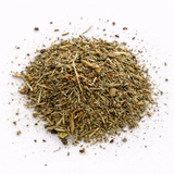 Dry herbs (Mane Attraction: Herbal Tea Blend) on a white background