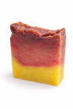 Two-layered soap bar with red and yellow layers (Patricia's Lavender Rose Soap: Eczema & Sensitive Skin) on a white background