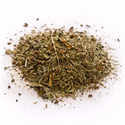 Pile of dried herbs (Pete's Dream: Herbal Tea Blend) on a white background