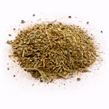 Pile of dried herbs (Pete's Dream: Herbal Tea Blend) on a white background