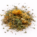 Pile of dried herbs and flowers (Tin Man's Tonic: Herbal Tea Blend) on a white background
