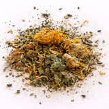 Dried herbs and flowers (What's the Bladder: Herbal Tea Blend) on a white background