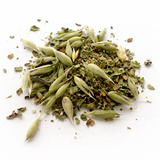 Pile of dried herbs (Bonzo's Bedtime Herbal Blend) on a white background