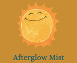 Label for afterglow mist featuring a smiling cartoon sun on a burnt orange background