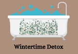 Label for Wintertime Detox featuring a claw footed bathtub with floral decorations filled to the brim with soapy water on a light brown background